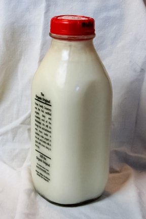 Milk bottle showing cream at the top